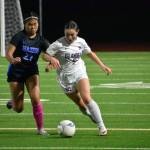 Jackie Gonzalez and Zoe Wong battle for the ball. Ben Ray / The Reporter