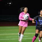 Audrey Lee holds the ball in her hands as the Hazen goalkeeper. Ben Ray / The Reporter