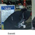 The jacket Harrison is seen wearing while picking out a sledgehammer at Lowes, matches the jacket worn by a suspect at the Everett and Renton Cash America robberies. Photos provided by Seattle Police Department