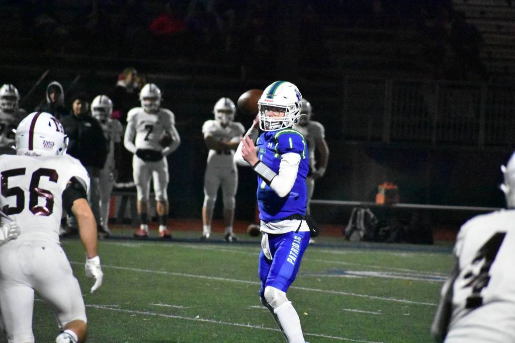 Dawson Durham makes a pass for Liberty. Ben Ray / The Reporter