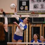 Hayden Quinto goes for the spike against Bellevue. Ben Ray / The Reporter
