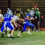 Spencer Bogh runs the ball for Liberty against Evergreen. Photo provided by Natasha Valach
