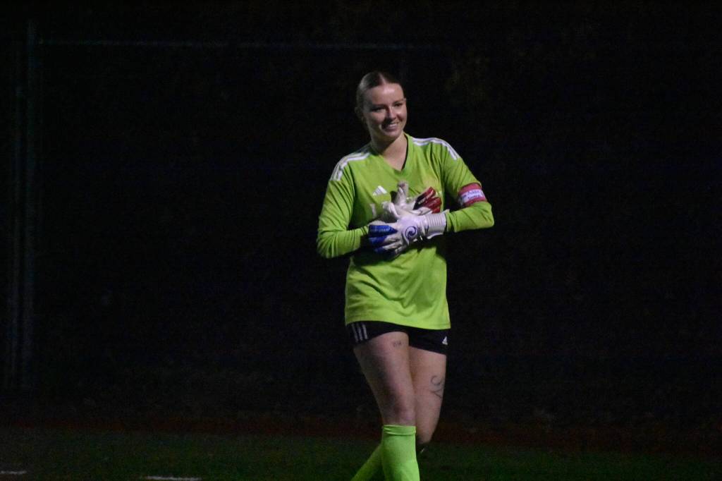 Peyton Warns gives a smile after saving a penalty. Ben Ray / The Reporter