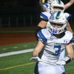 Spencer Bogh celebrates his last second touchdown against Lakes. Ben Ray / The Reporter