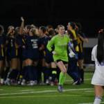 Callise Chin (foreground) and Peyton Warns (background) leave the field as Bellevue celebrates. Ben Ray / The Reporter