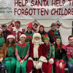 Santa and his elves will be delivering gifts to families who otherwise might not be able to afford Christmas throughout western Washington. Photo courtesy of Greg Bakke.