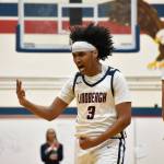 Ayoub Jarato celebrates a three pointer for the Eagles. Ben Ray / The Reporter