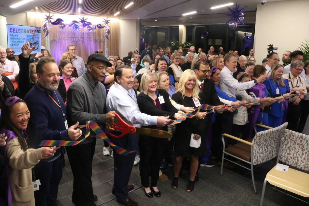 The Cancer Center at Valley Medical Center in Renton is officially open and serving patients. After seven years, the center finally welcomed patients on Feb. 3. Pictured is the moment the ribbon was cut at the new Cancer Center. Photo by Bailey Jo Josie/Sound Publishing