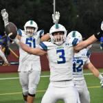 Libertys Spencer Bogh stretches his arms out after scoring a touchdown against Hazen.