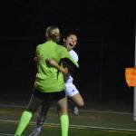 Libertys Peyton Warns and Mylene Augila embrace each other after beating Gig Harbor.