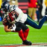 Seattle Seahawks linebacker Ernest Jones IV tackles San Francisco 49ers running back Christian McCaffrey on Jan. 3 at Levis Stadium in Santa Clara, California. (Photo courtesy of the Seattle Seahawks)