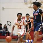 Adan Abdi runs the floor for Renton against Lindbergh. Ben Ray / The Reporter