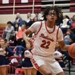 Jalen Taylor drives to the basket for Renton against Lindbergh. Ben Ray / The Reporter