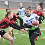 Brecken Harris tries to avoid a tackler from Lincoln.