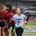 Marisa Aoki walks off the field as Lincoln celebrates. Photos by Ben Ray / The Reporter
