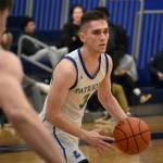 Royce Rowe dribbles the ball for Liberty. Ben Ray / The Reporter