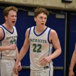 Connor Mayer (left) yells as Jackson Whitaker heads to the free throw line after drawing a foul. Ben Ray / The Reporter