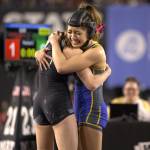 Vina Nguyen of Hazen hugs her opponent after her second state title. Ben Ray / The Reporter