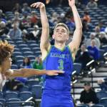 Royce Rowe takes a three for Liberty inside the Tacoma Dome. Ben Ray / The Reporter