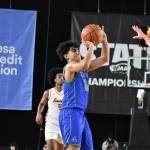 Tyson Burley takes a 3-pointer for Liberty inside the Tacoma Dome. Ben Ray / The Reporter