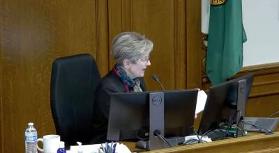Inquest Administrator Julia Garratt giving juror instructions. Screenshot of the inquest stream.