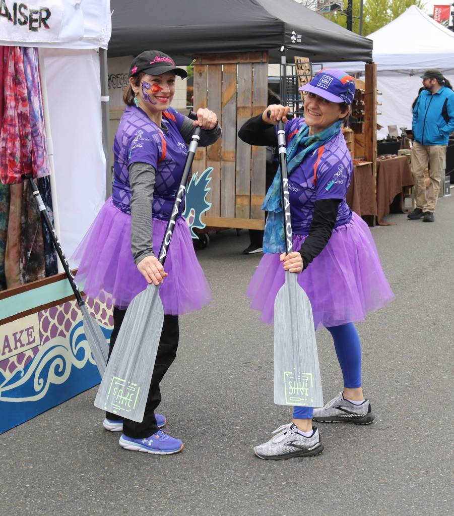Survivor SAKE, Team Survivor Northwests dragon boating team, had their own booth at the Dragon Landing. Photo by Bailey Jo Josie/Sound Publishing.