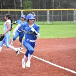 Sarah Hoki runs home for Liberty. Ben Ray / The Reporter