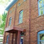 The new Renton Historical Society and Genealogy building was built in 1898 and was once the Snoqualmie Falls Substation in Renton. According to RHSG president Carrie Bergquist, the now-third floor windows originally had electrical cables running through them. Photo by Bailey Jo Josie/Sound Publishing