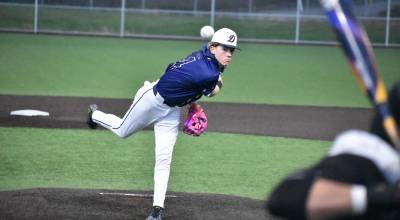 Tyler Buol makes a pitch against Kentlake. Ben Ray / The Mirror
