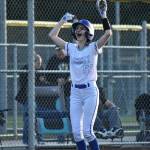 Berlyn Crockett cheers after reaching third base against Inglemoor. Ben Ray / The Reporter