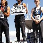 Kenyon Andrews stands atop the podium following his state record run. Photo provided by Maria Dorsten.