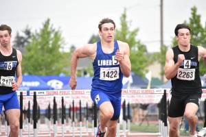 Sutton Flint runs the 100 m hurdles. Ben Ray / The Reporter