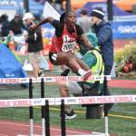 Brooklyn Kimp-Stephens leaps over hurdles for Renton. Ben Ray / The Reporter