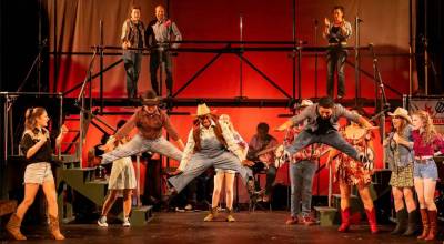 Ren helps Willard learn how to dance in Footloose the musical, playing at the Renton Civic Theatre until June 21. Photo courtesy of the Renton Civic Theatre.