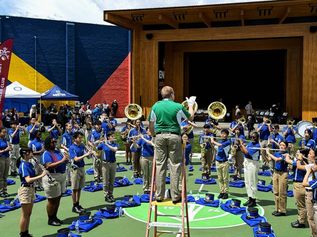 The Hazen High School band performed hit songs to open the Legacy Square opening event.