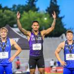 Miguel Rosario stands atop the podium at the Mountain West Conference championships. Photo provided by Miguel Rosario.