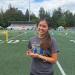 Angelica Nguyen holds her trophy following the heptathlon. Photo provided by Angelica Nguyen.