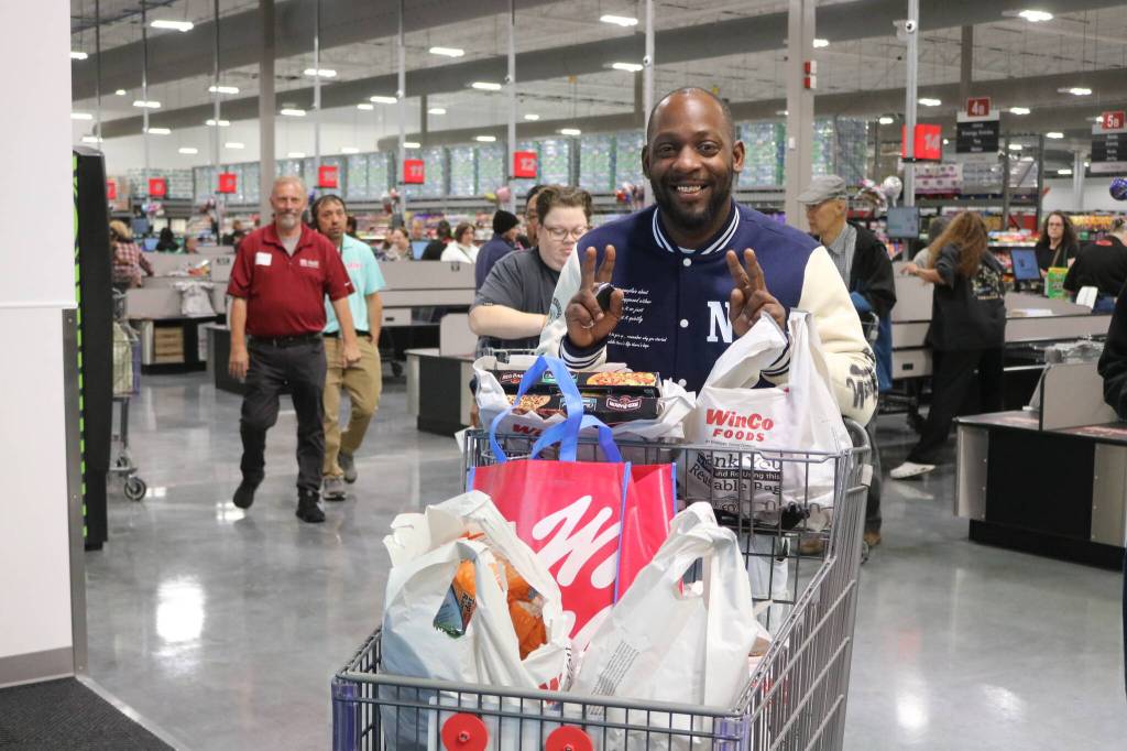 First-day WinCo shoppers were gifted a variety of complimentary grocery goods as they exited the store. Photo by Bailey Jo Josie/Sound Publishing.