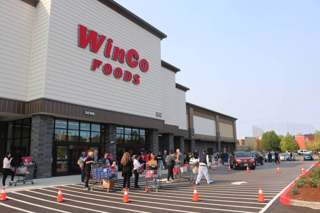 A queue stretched the length of the massive building the morning of opening day for the Renton WinCo. Photo by Bailey Jo Josie/Sound Publishing.
