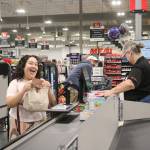 Some of the first few hundred customers to use the brand new WinCo checkout lanes. Photo by Bailey Jo Josie/Sound Publishing.