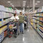 Shoppers peruse the perfectly-faced aisles of the Renton WinCo. Photo by Bailey Jo Josie/Sound Publishing.